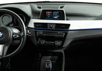 Подержанный автомобиль BMW X1 2018 года (14 фото)