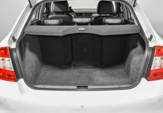 Подержанный автомобиль Skoda Rapid Liftback 2014 года (17 фото)