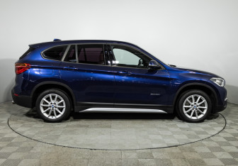 Подержанный автомобиль BMW X1 2015 года (4 фото)