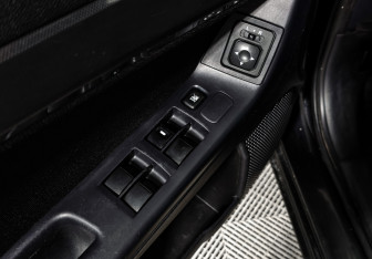 Подержанный автомобиль Mitsubishi Lancer Sedan 2009 года (10 фото)