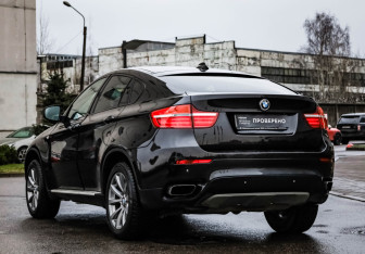 Подержанный автомобиль BMW X6 2013 года (9 фото)