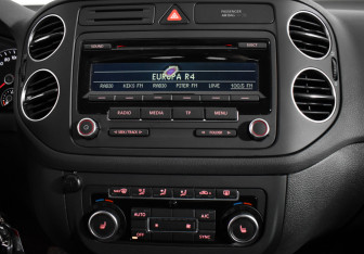 Подержанный автомобиль Volkswagen Golf Plus 2013 года (14 фото)