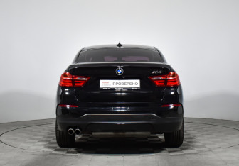 Подержанный автомобиль BMW X4 2015 года (6 фото)