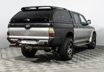 Подержанный автомобиль Mitsubishi L200 2005 года (5 фото)