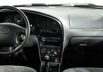 Подержанный автомобиль Kia Spectra Sedan 2007 года (14 фото)