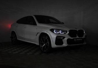 Подержанный автомобиль BMW X6 2021 года (34 фото)