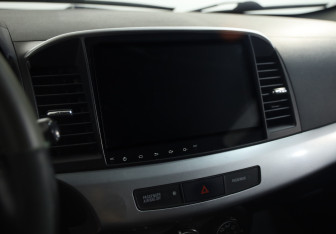 Подержанный автомобиль Mitsubishi Lancer Sedan 2010 года (12 фото)