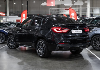 Подержанный автомобиль BMW X6 2018 года (11 фото)