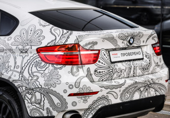Подержанный автомобиль BMW X6 2013 года (12 фото)