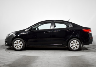 Подержанный автомобиль Kia Rio Sedan 2015 года (8 фото)