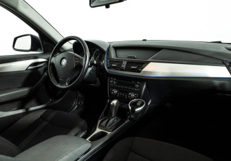 Подержанный автомобиль BMW X1 2014 года (9 фото)