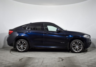 Подержанный автомобиль BMW X6 2016 года (4 фото)