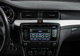 Подержанный автомобиль Skoda Superb Liftback 2011 года (18 фото)