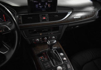 Подержанный автомобиль Audi A6 allroad 2013 года (22 фото)