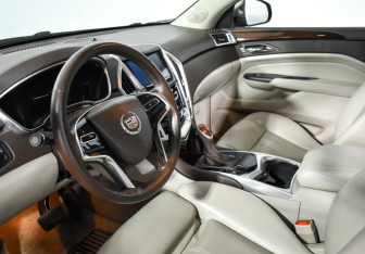 Подержанный автомобиль Cadillac SRX 2014 года (9 фото)