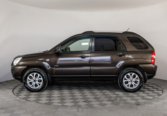 Подержанный автомобиль Kia Sportage 2006 года (8 фото)
