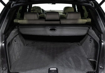 Подержанный автомобиль BMW X5 2010 года (25 фото)