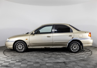 Подержанный автомобиль Kia Spectra Sedan 2006 года (8 фото)