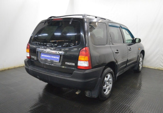 Подержанный автомобиль Mazda Tribute 2001 года (5 фото)