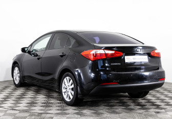 Подержанный автомобиль Kia Cerato Sedan 2013 года (7 фото)