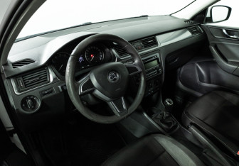 Подержанный автомобиль Skoda Rapid Liftback 2014 года (11 фото)