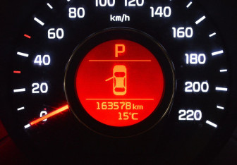 Подержанный автомобиль Kia Rio Sedan 2015 года (15 фото)