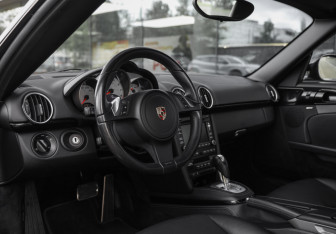 Подержанный автомобиль Porsche Cayman 2010 года (15 фото)