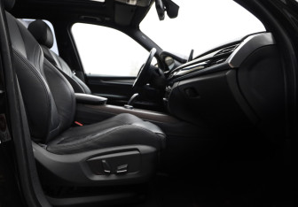 Подержанный автомобиль BMW X5 2015 года (26 фото)