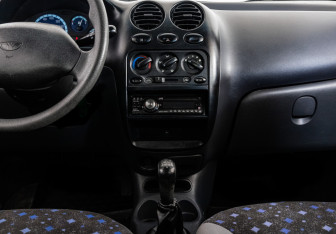 Подержанный автомобиль Daewoo Matiz 2013 года (18 фото)