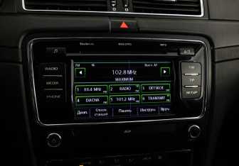 Подержанный автомобиль Skoda Superb Liftback 2014 года (14 фото)