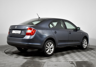 Подержанный автомобиль Skoda Rapid Liftback 2015 года (5 фото)