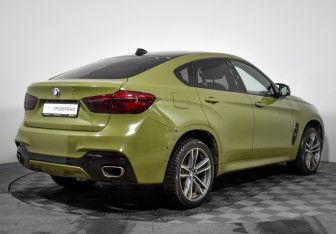 Подержанный автомобиль BMW X6 2014 года (5 фото)