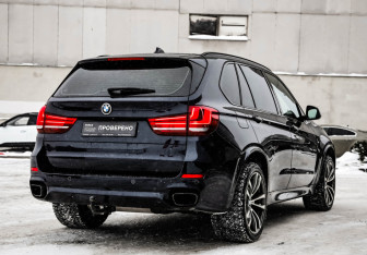 Подержанный автомобиль BMW X5 2016 года (7 фото)