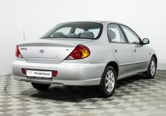 Подержанный автомобиль Kia Spectra Sedan 2007 года (5 фото)