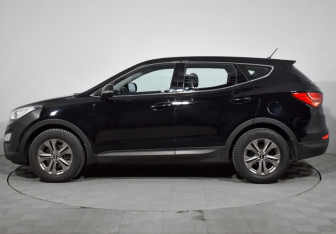 Подержанный автомобиль Hyundai Santa Fe 2015 года (9 фото)