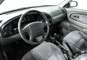 Подержанный автомобиль Kia Spectra Sedan 2007 года (11 фото)