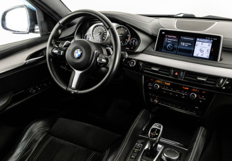 Подержанный автомобиль BMW X6 2018 года (18 фото)