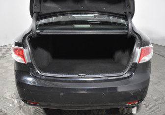 Подержанный автомобиль Toyota Avensis Sedan 2009 года (17 фото)