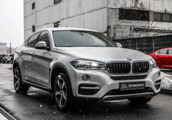 Подержанный автомобиль BMW X6 2016 года (4 фото)