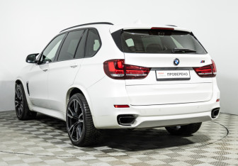 Подержанный автомобиль BMW X5 2017 года (7 фото)