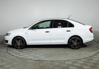 Подержанный автомобиль Skoda Rapid Liftback 2014 года (8 фото)
