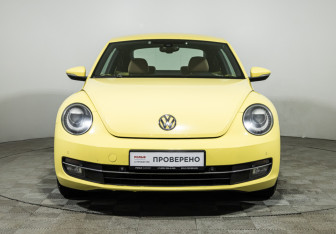 Подержанный автомобиль Volkswagen Beetle Hatchback 2014 года (2 фото)