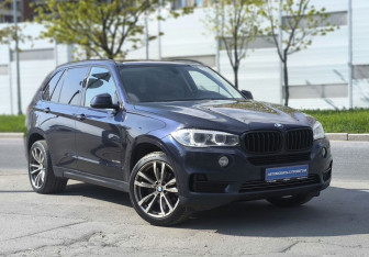 Подержанный автомобиль BMW X5 2014 года (8 фото)