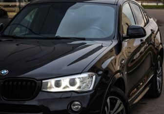 Подержанный автомобиль BMW X4 2015 года (2 фото)