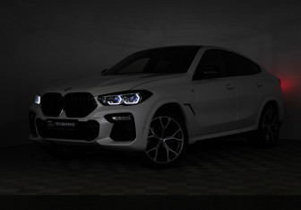 Подержанный автомобиль BMW X6 2021 года (33 фото)
