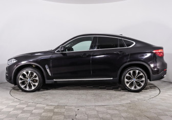 Подержанный автомобиль BMW X6 2016 года (16 фото)