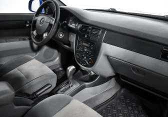 Подержанный автомобиль Daewoo Gentra Sedan 2014 года (13 фото)