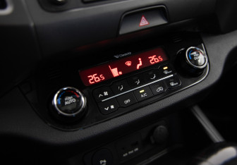 Подержанный автомобиль Kia Sportage 2013 года (17 фото)