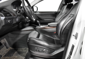 Подержанный автомобиль BMW X6 2013 года (12 фото)