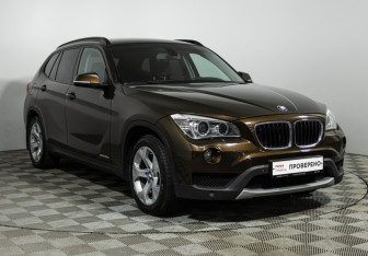 Подержанный автомобиль BMW X1 2014 года (3 фото)